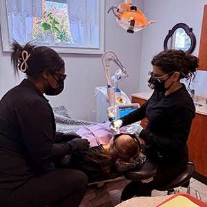 Team at Second Line Family Dentistry working with Solea dental laser
