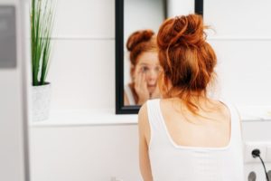 person looking in the mirror