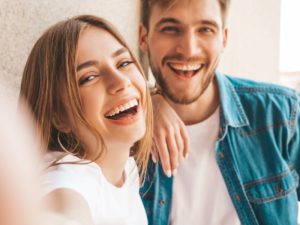 Couple with beautiful, healthy teeth